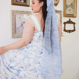 Back detail of the Blue Toile Angel Dress with blue toile bow and lace straps.