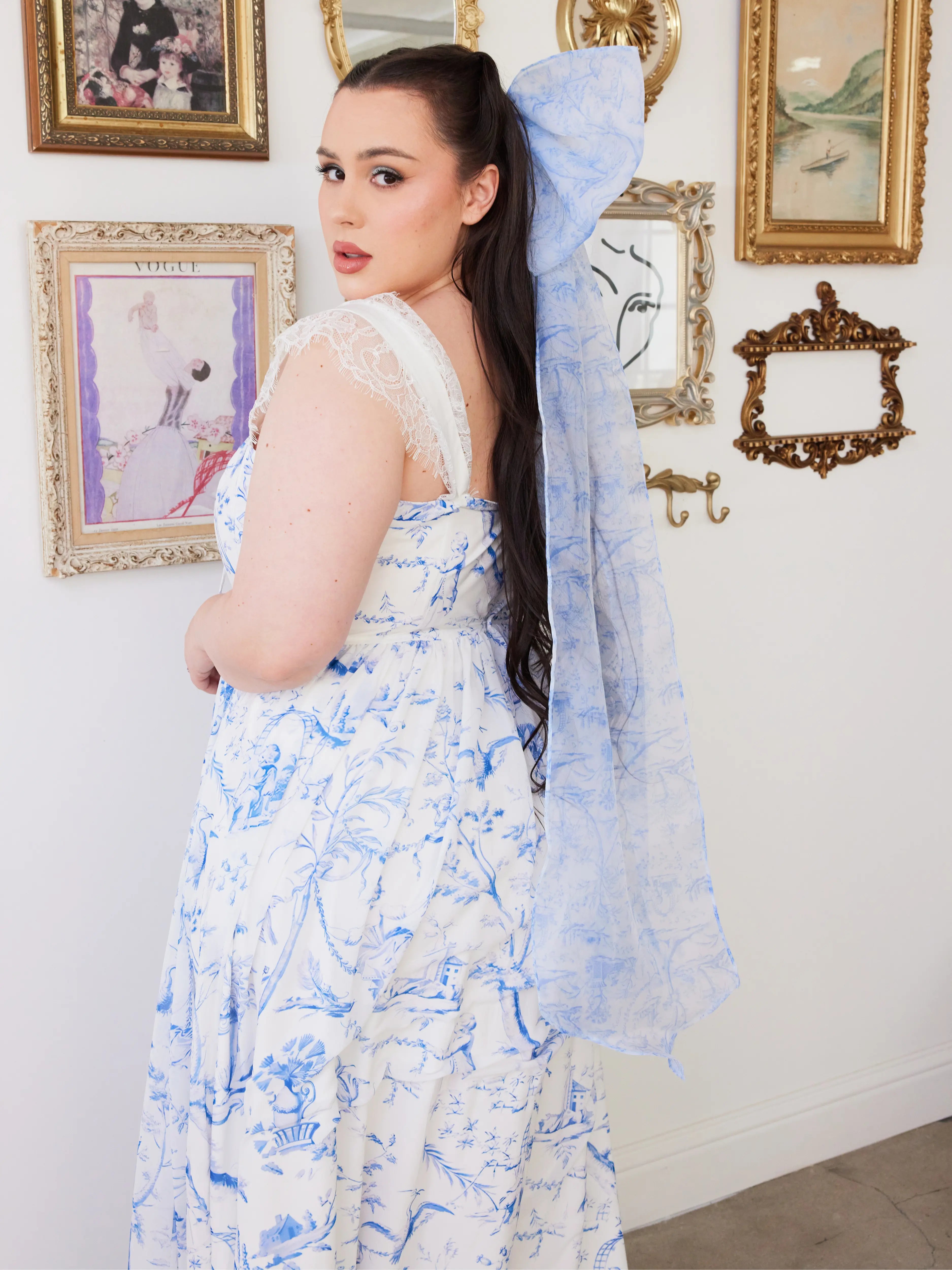Oversized Blue Toile Grand Hair Bow with long flowing tails, paired with a matching toile print dress in a whimsical, feminine style.