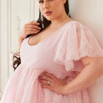 Detail shot of the Cherub Pink Lace Dress showing soft lace sleeves and fitted bodice, perfect for whimsical and romantic occasions.