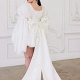 Back view of the Ivory Bridal Grand Bow Belt featuring dramatic 80-inch train and voluminous bow, perfect for statement bridal looks.