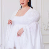 Front view of Ivory Fairy Puff Sleeve Dress on plus-size model, highlighting square neckline and embroidered tulle fabric.