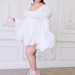 Ivory Fairy Puff Sleeve Dress with lace detailing and voluminous sleeves, styled for whimsical women's mini dress looks.