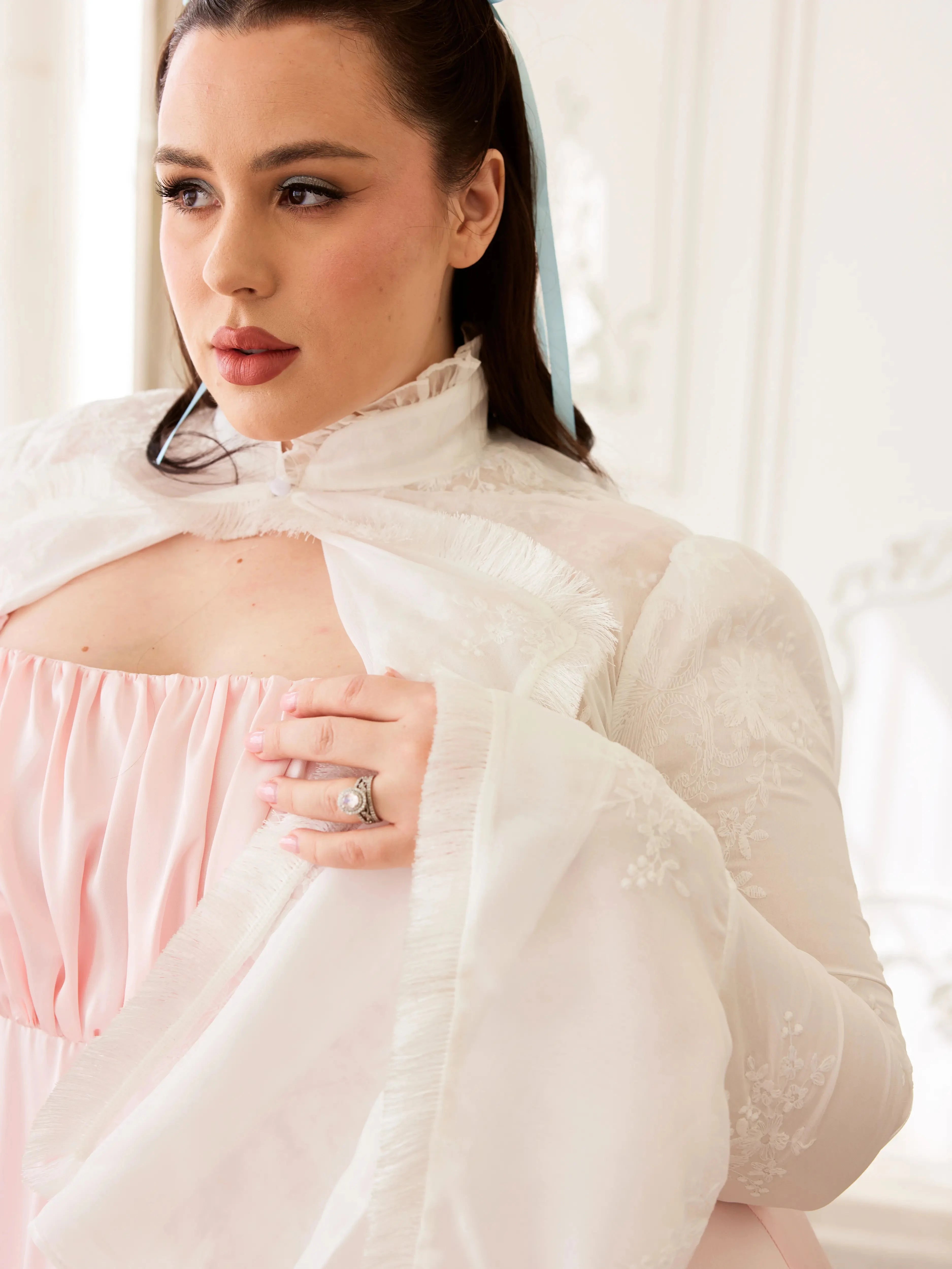Close-up of the Ivory Lady Elizabeth Bolero Jacket with delicate embroidery, fringe details, and high ruffled collar for a vintage look.