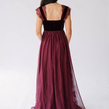 Scarlet red floor-length gown with velvet corset bodice and flowing chiffon skirt.