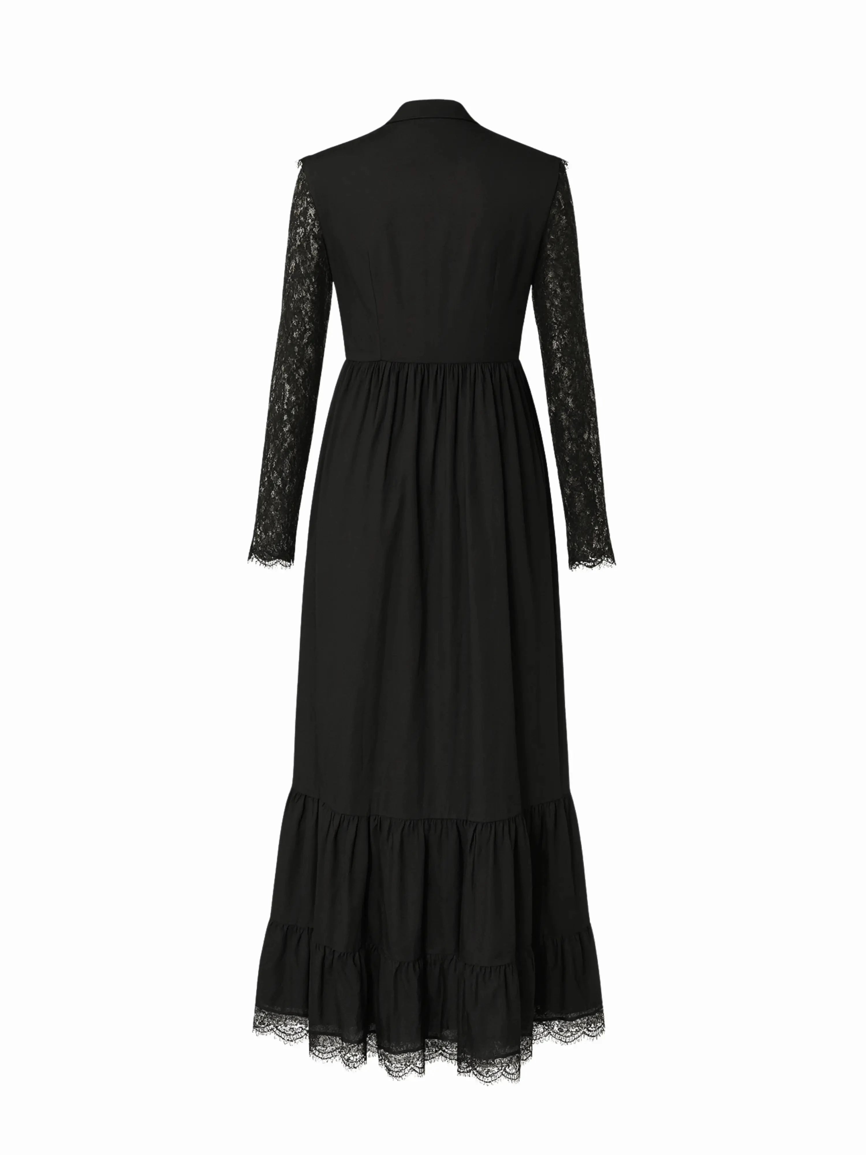 A back view of a black cotton dress called the Eveline dress, with lace sleeves and hem on a white background