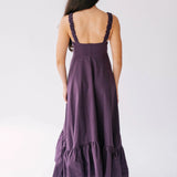Back view of The Everyday Cotton Midi Dress highlighting ruched straps and flared hem, ideal for everyday wear.