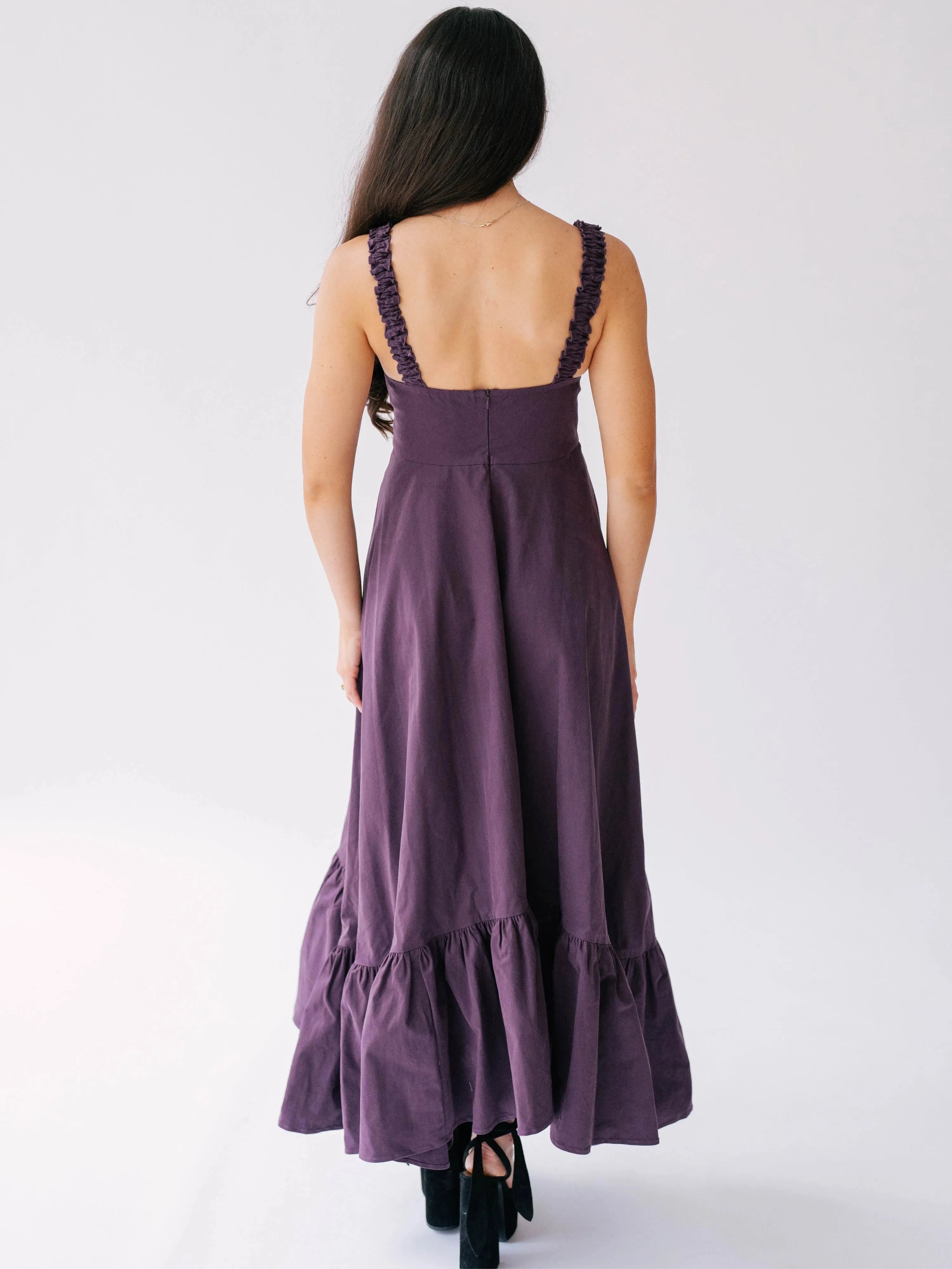Back view of The Everyday Cotton Midi Dress highlighting ruched straps and flared hem, ideal for everyday wear.