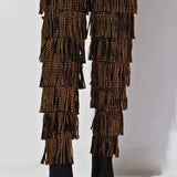 Back view of The Fringe Thigh High Boots by Azalea Wang showcasing layered fringe and gold studs for a dramatic, high-fashion footwear look.