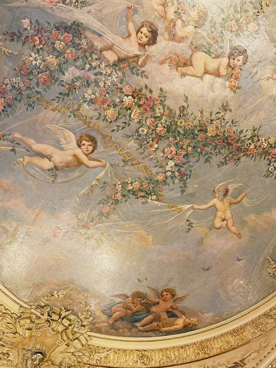 Ceiling Fresco of cherubs and florals dancing across a sky