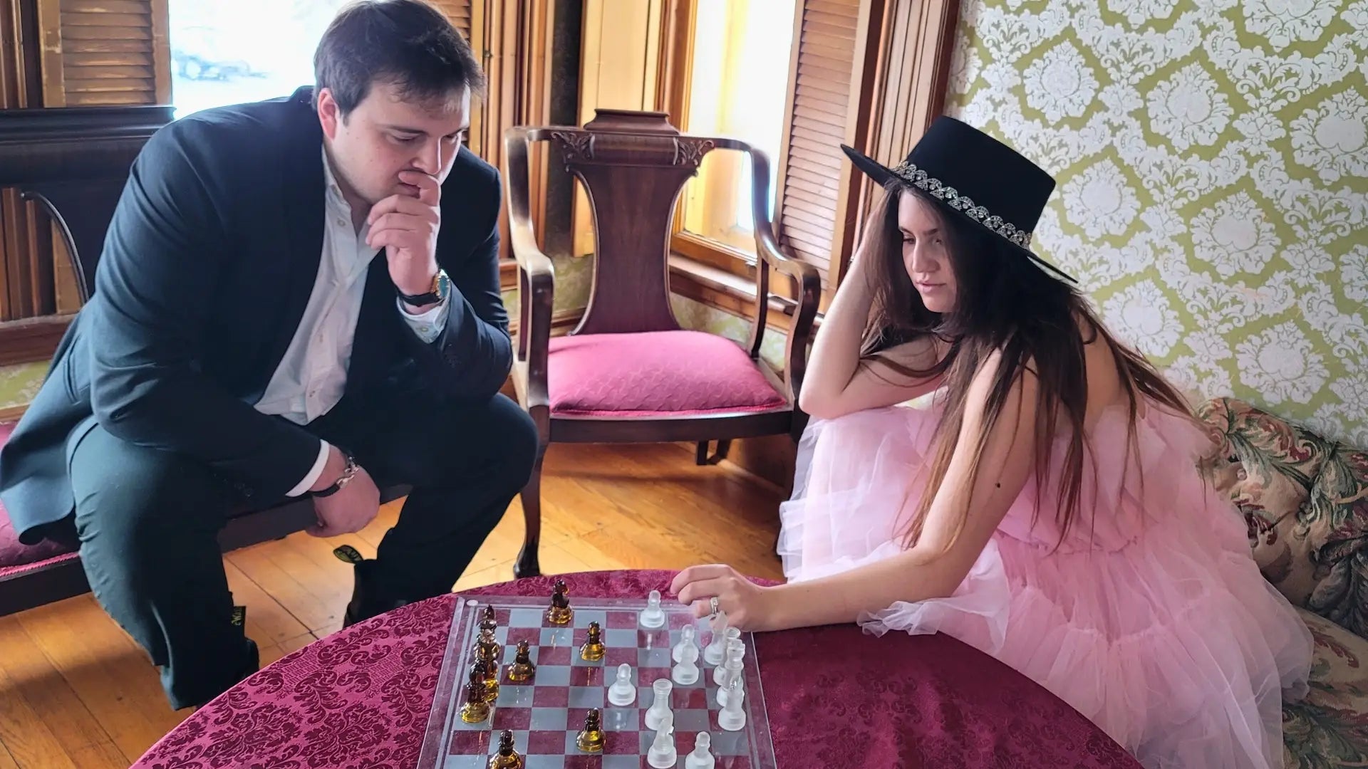 Chess board set up for a game between two players reflecting major life decisions.