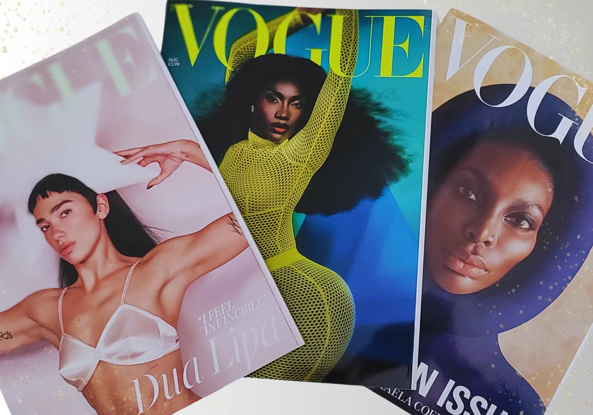 Three Vogue magazines where Ivory Sheep was featured. Each cover shows a different model on a white background.