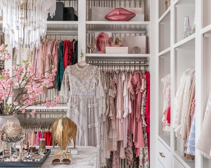 Rachel Parcell dream closet with chandelier and embroidered dress.