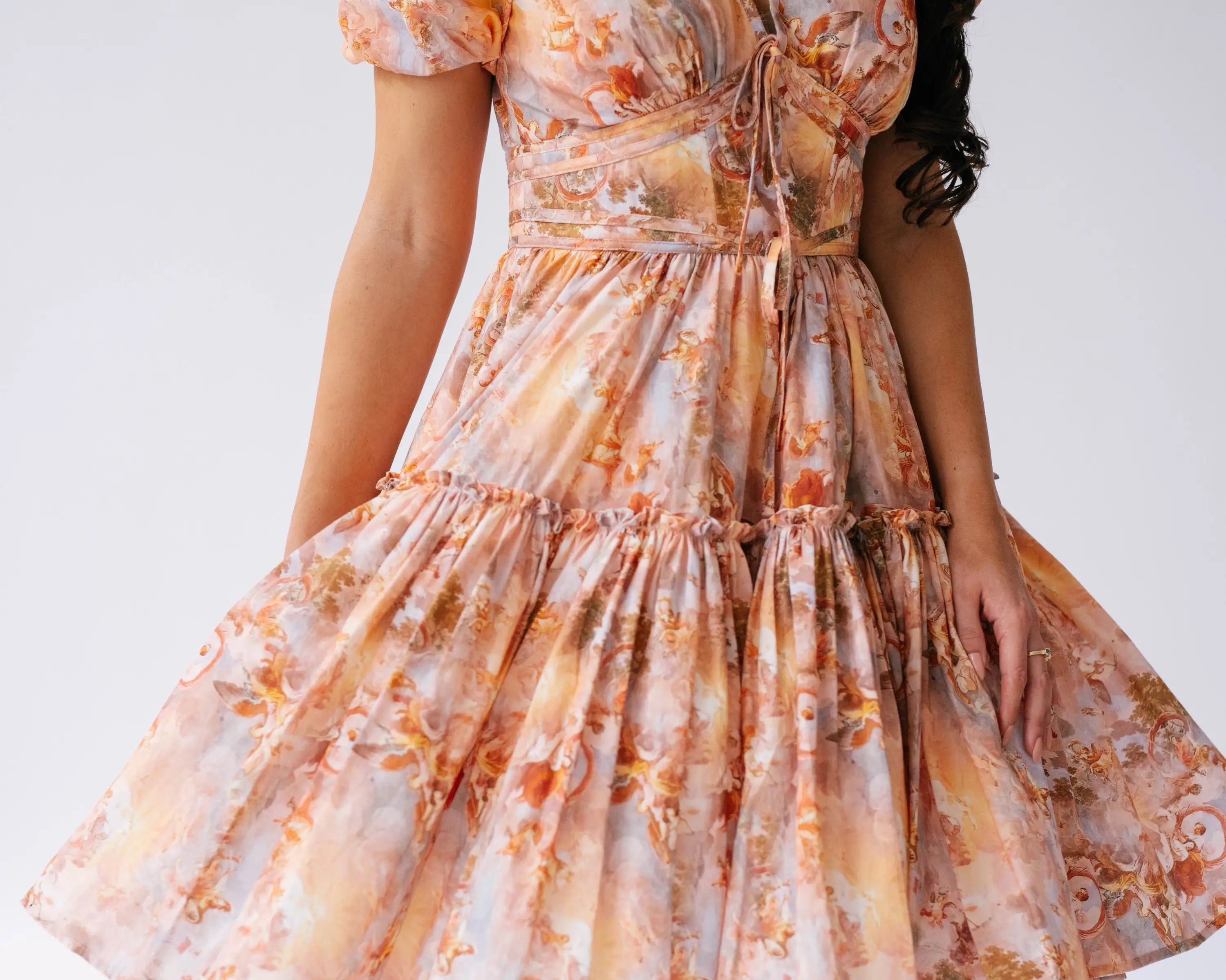 The Grace Cotton Day Dress on model twirling in the dress