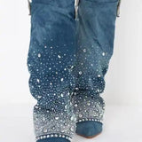 The Allo Bedazzled Denim Boots - It’s no surprise that these Azalea Wang bedazzled denim knee high boots are so breathtaking to look at. In fact, these shoes are a fashion statement in and of themselves. Durable and soft to the touch, these bedazzled boot