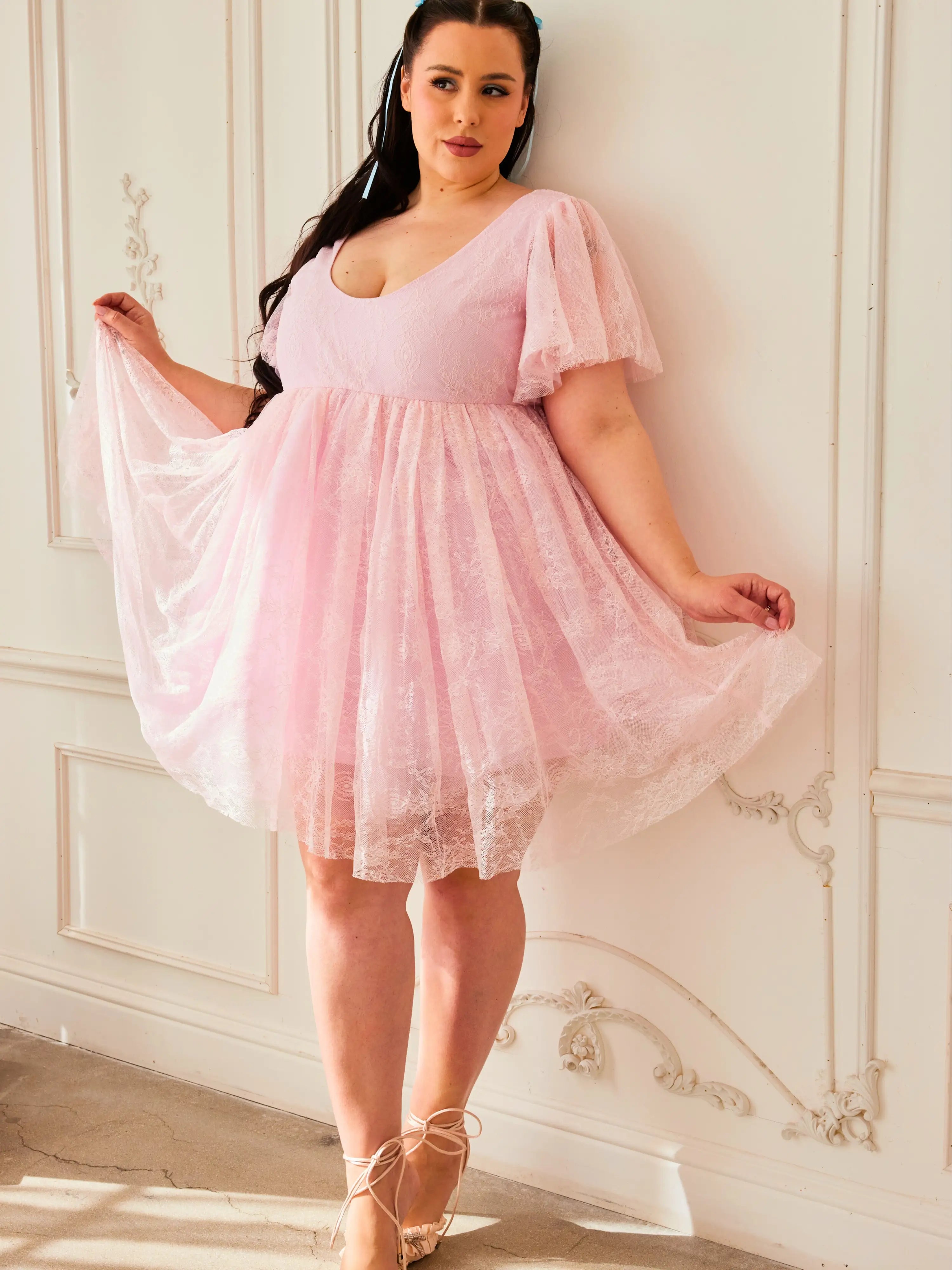 The Pink Candy Cherub Dress - Introducing a new design- The Cherub Dress, a heavenly creation spun from the most delicate Pink Candy Lace. This ethereal ensemble is designed for those who delight in the whimsical and the wondrous, offering a sartorial esc