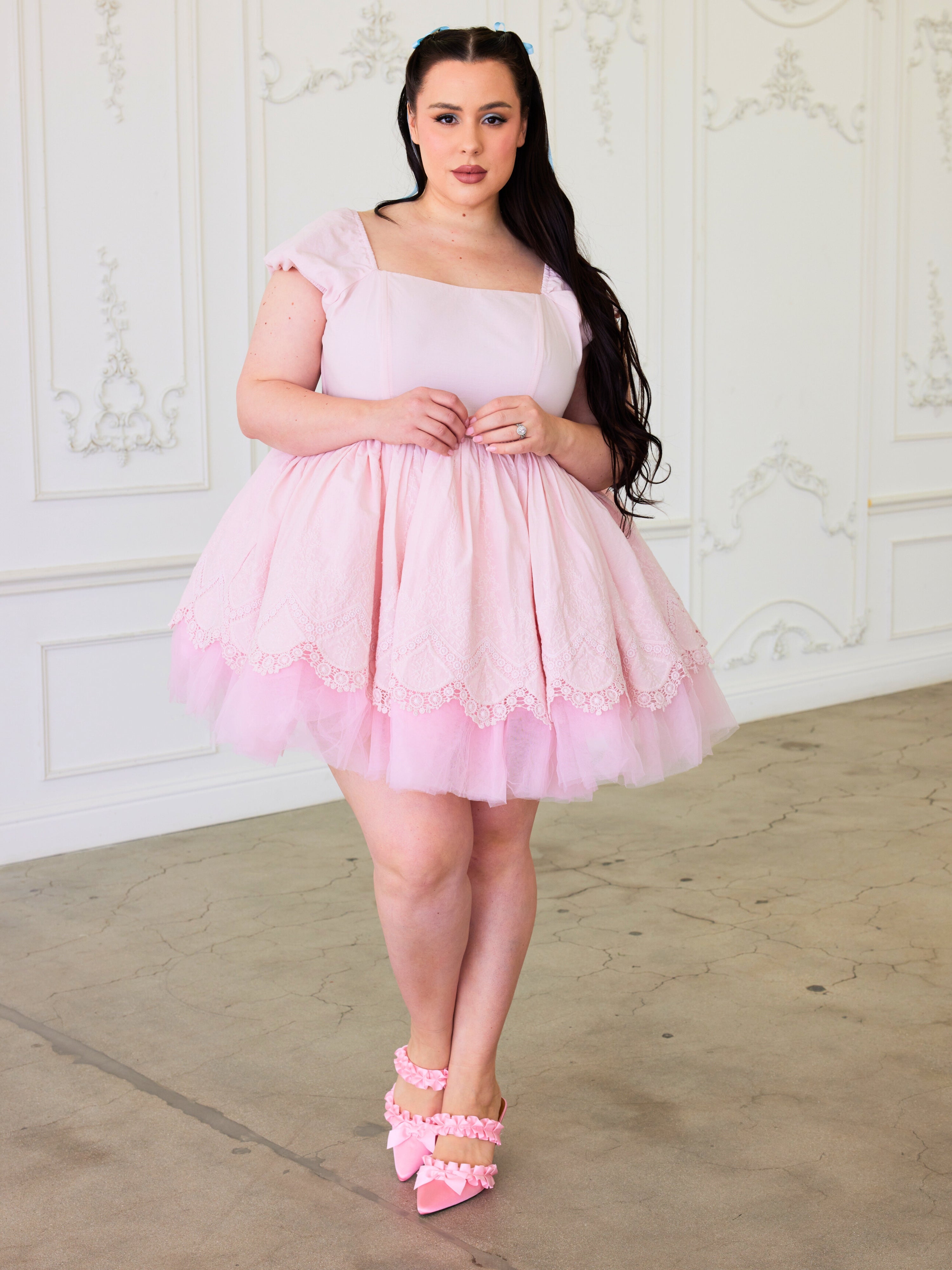 The Soft Pink Blossom Dress - Welcoming the Blossom Mini in Soft Pink, a captivating ensemble that marries the timeless elegance of the Magnolia Puff silhouette with the fresh charm of spring. Crafted from 100% cotton, this dress is a testament to the bea