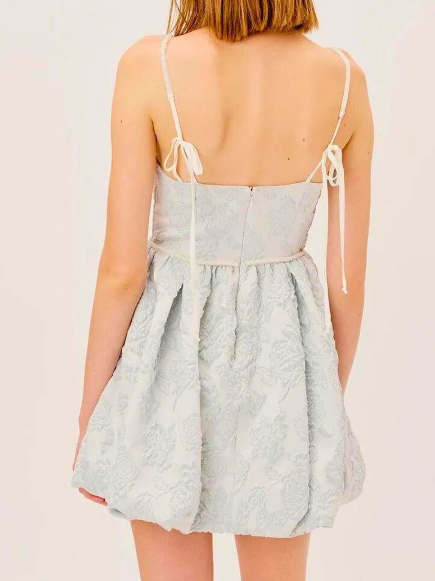 The Lydia Party Dress - The Lydia Party Dress by For Love & Lemons is a mini dress lovers dream! Features the most delicate details, this is a dress that checks all the boxes for a fairytale wardrobe. Made of a light blue and sliver jacquard fabric, this