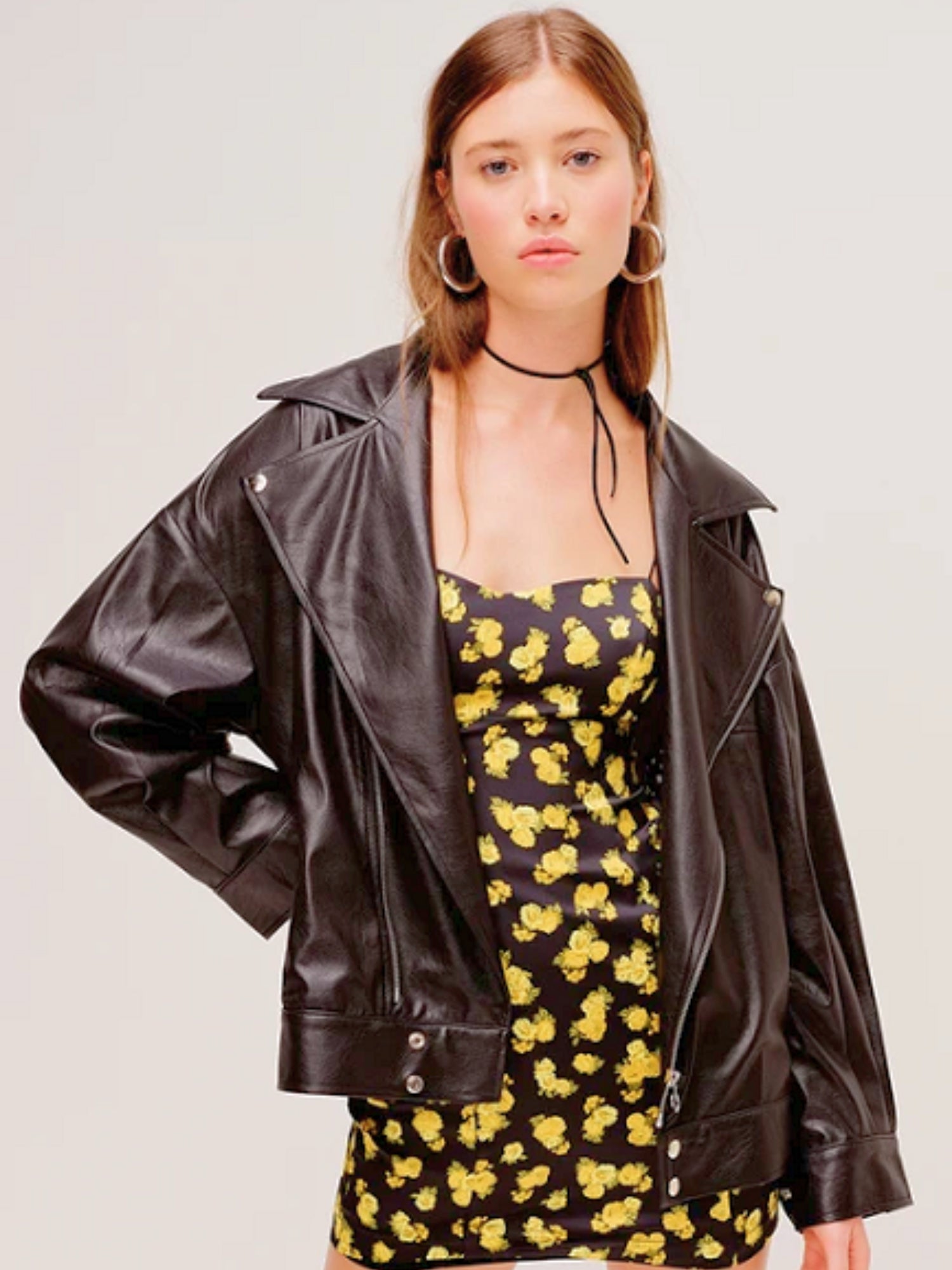 The Dillon Moto Jacket - The Dillon Jacket by For Love and Lemons is a must have for every moto jacket lover. Made of a faux leather, this oversized jacket is an icon in itself that can be paired with absolutely anything. Pair this with a Selkie Puff Dres