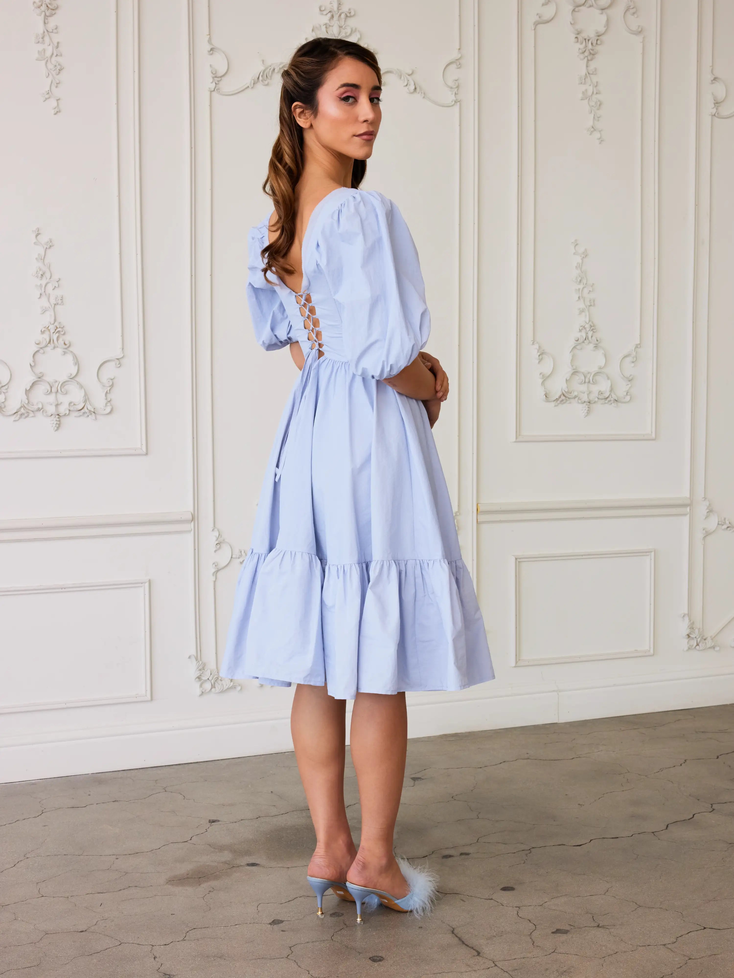 The Alice Blue Josephine Midi Gown - Discover the enchanting allure of the Josephine Midi Dress, a dreamy confection in the softest Alice blue. Crafted from luxurious nylon taffeta, this dress is a poetic ode to femininity, blending timeless elegance with
