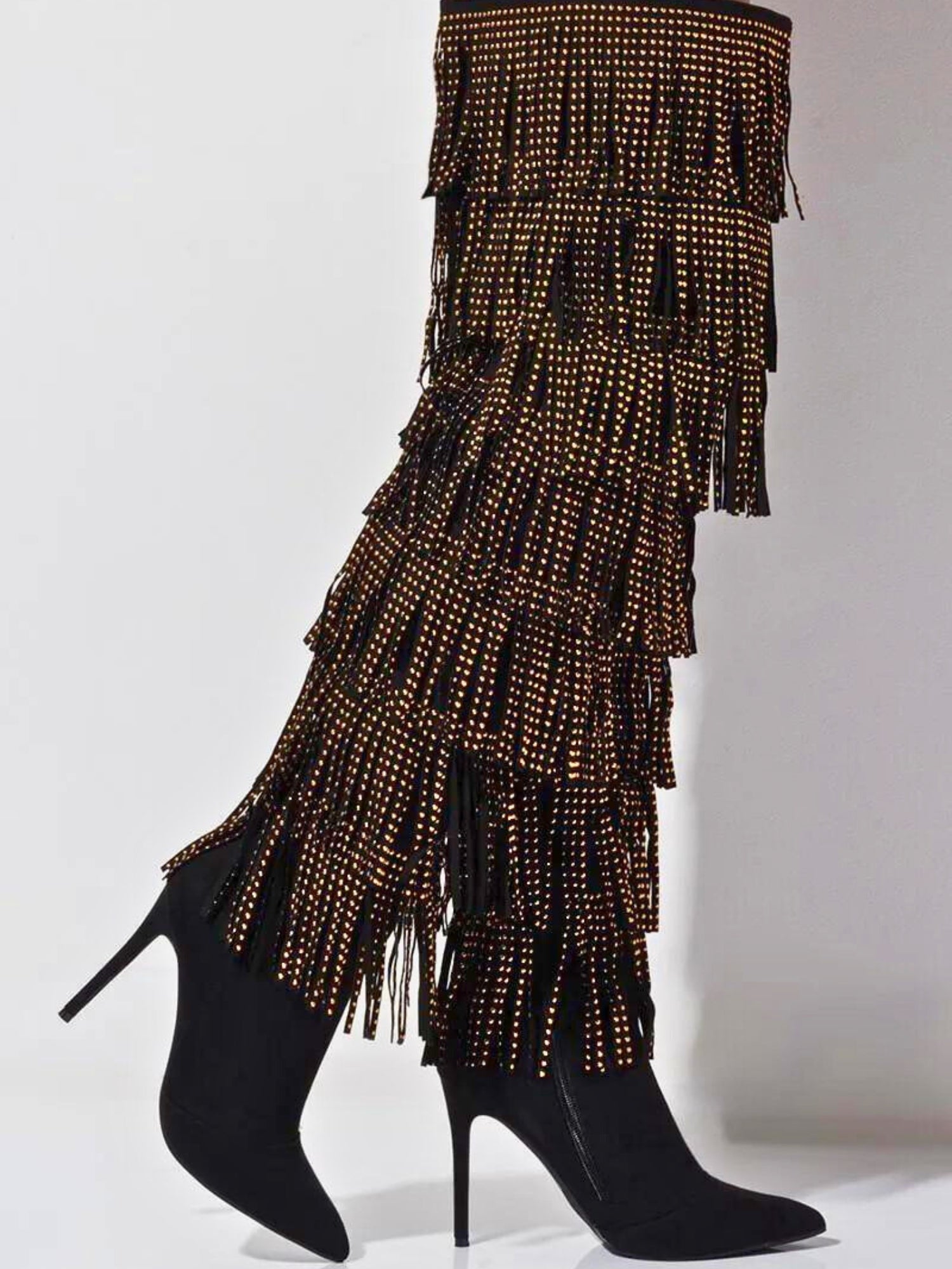The Fringe Thigh High Stiletto Boots - The Fringe Thigh High Stiletto Boots by Azalea Wang are the definition of show stoppers! They are a need for anyone who loves to bring the drama! Draped in multi layers of fringe that is adorned in gold studs, this b