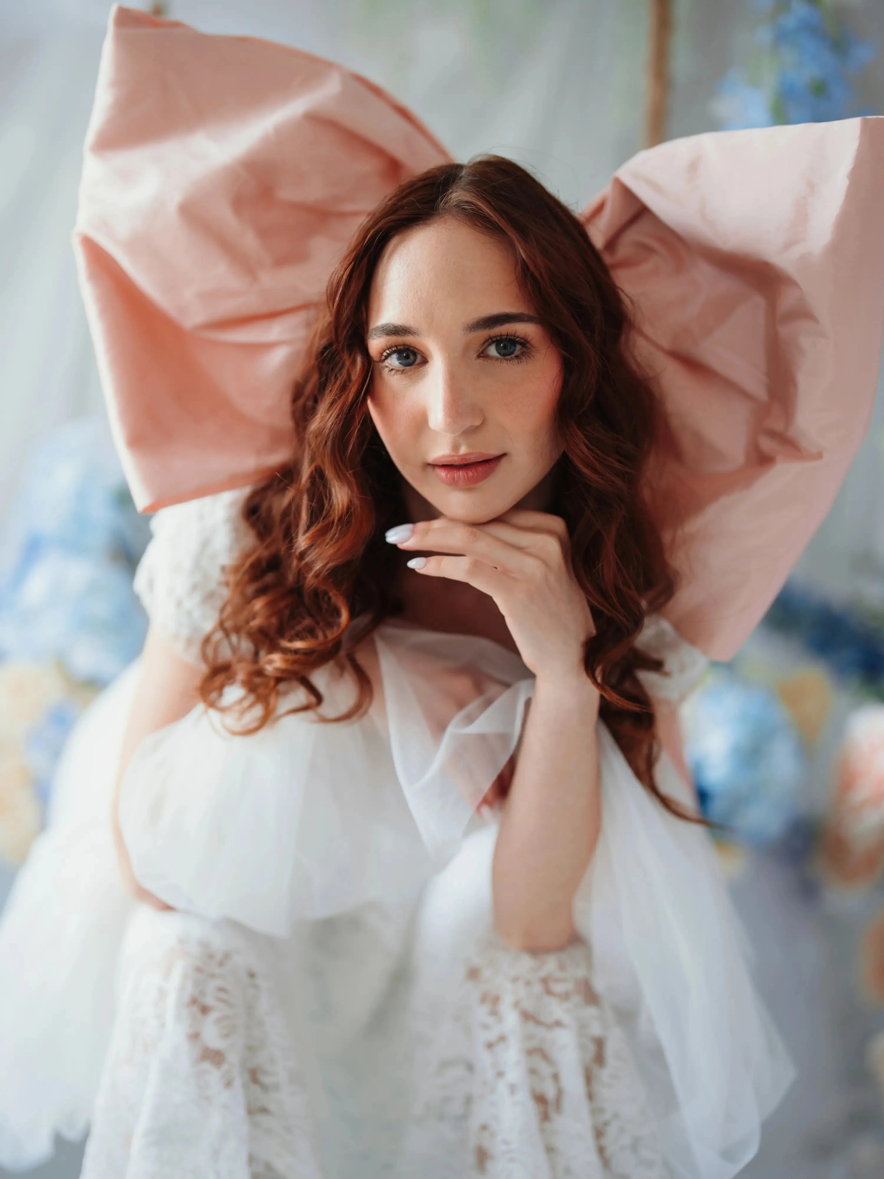 Baby Antoinette Pink Hair Bow styled with a white lace dress, featuring oversized silk taffeta design for coquette fashion lovers.