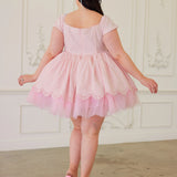 Tulle soft pink party dress with cap sleeves and a flared skirt.