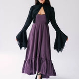 Black lace bolero jacket over top a heavy cotton purple midi dress.