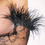 Black lace and feather decorative opera glove.