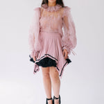 The Eleanor Dusty Pink Lace Blouse paired with a pink tulle puff skirt.
