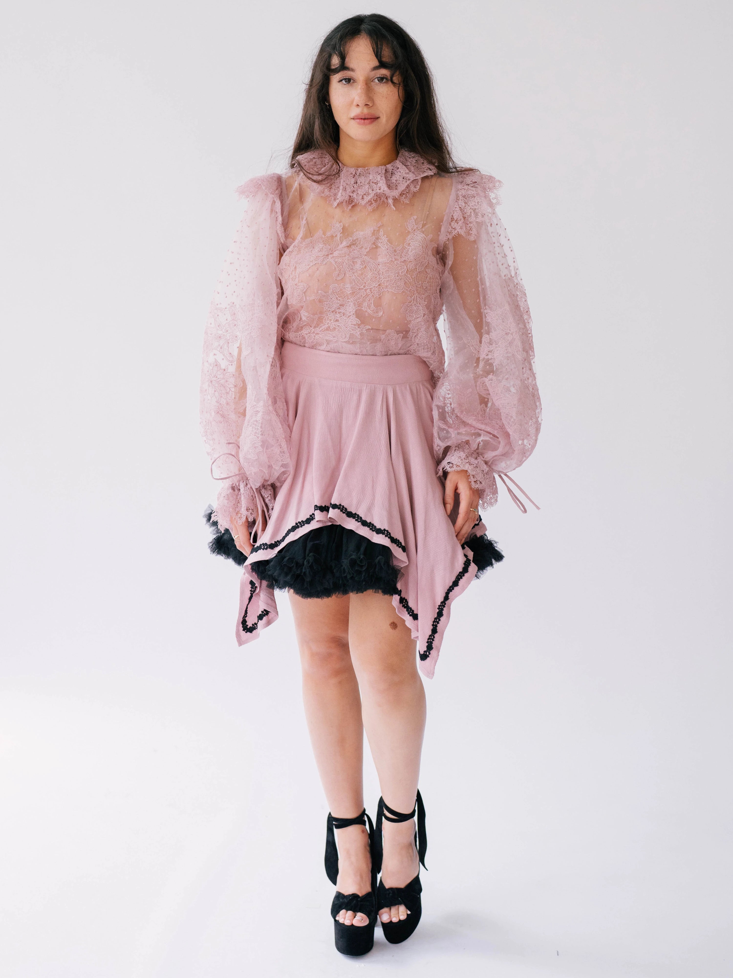 The Eleanor Dusty Pink Lace Blouse paired with a pink tulle puff skirt.