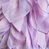 Delicate lavender flower petals highlight the hand cut and hand dyed Eventyr Tulip Dress