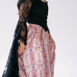 Victorian inspired fashion corset top, crafted with delicate black lace and features dramatic extra long sleeves.