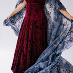 Burgundy velvet  midi dress with a empire waist bodice and removable belt, underneath a floor length victorian inspired cloak.