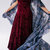 Burgundy velvet  midi dress with a empire waist bodice and removable belt, underneath a floor length victorian inspired cloak.