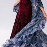 Red velvet midi dress with a flowing oversized poly organza cape.