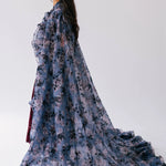 The High Priestess Victorian Cloak is an oversized flowing victorian purple poly organza cape with a light blue and pink floral print.