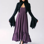 The Lady Elizabeth Midnight Black Victorian Jacket, a black bell sleeve bolero jacket overtop The Cotton Everyday Midi Dress, a regal purple heavy cotton midi dress.