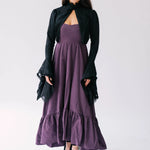 Purple midi dress with ruffled hem paired with a black shrug bell sleeve black lace jacket.