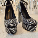 Black platform heels with sparkly rhinestones perfect for a gown or stylish evening look