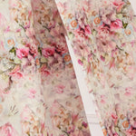 Floral fabric with pink roses and delicate blooms in a romantic vintage pattern called Rosewater.