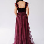 Scarlet red floor-length gown with velvet corset bodice and flowing chiffon skirt.