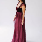 Scarlet red velvet corset bodice and chiffon floor-length gown with lace detailed straps.