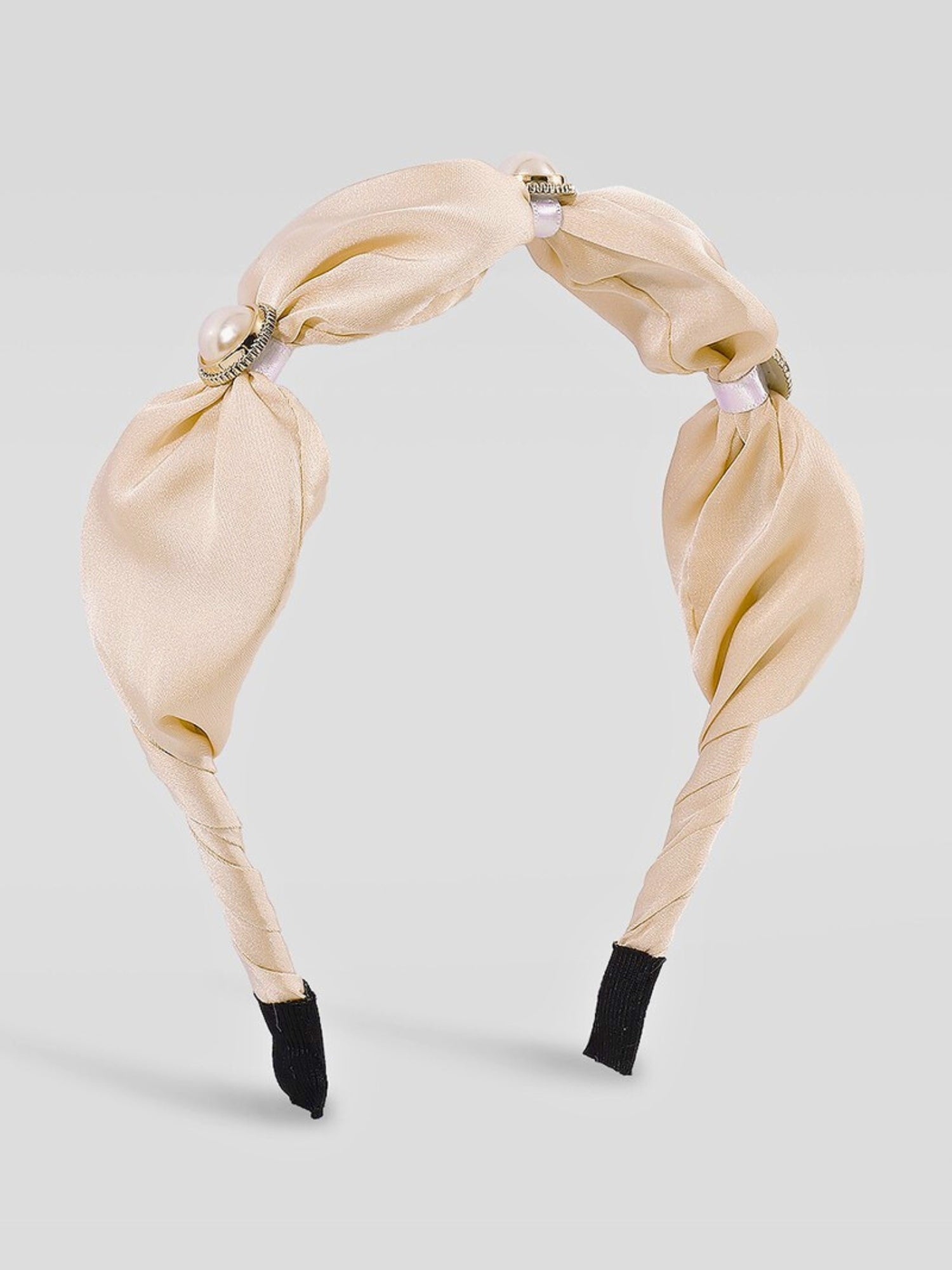 Beige fabric Adorned Pearl Headband with knotted bow design and jeweled accents