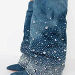 Embellished blue azalea wang bedazzled denim jeans with silver studs from hem to knee