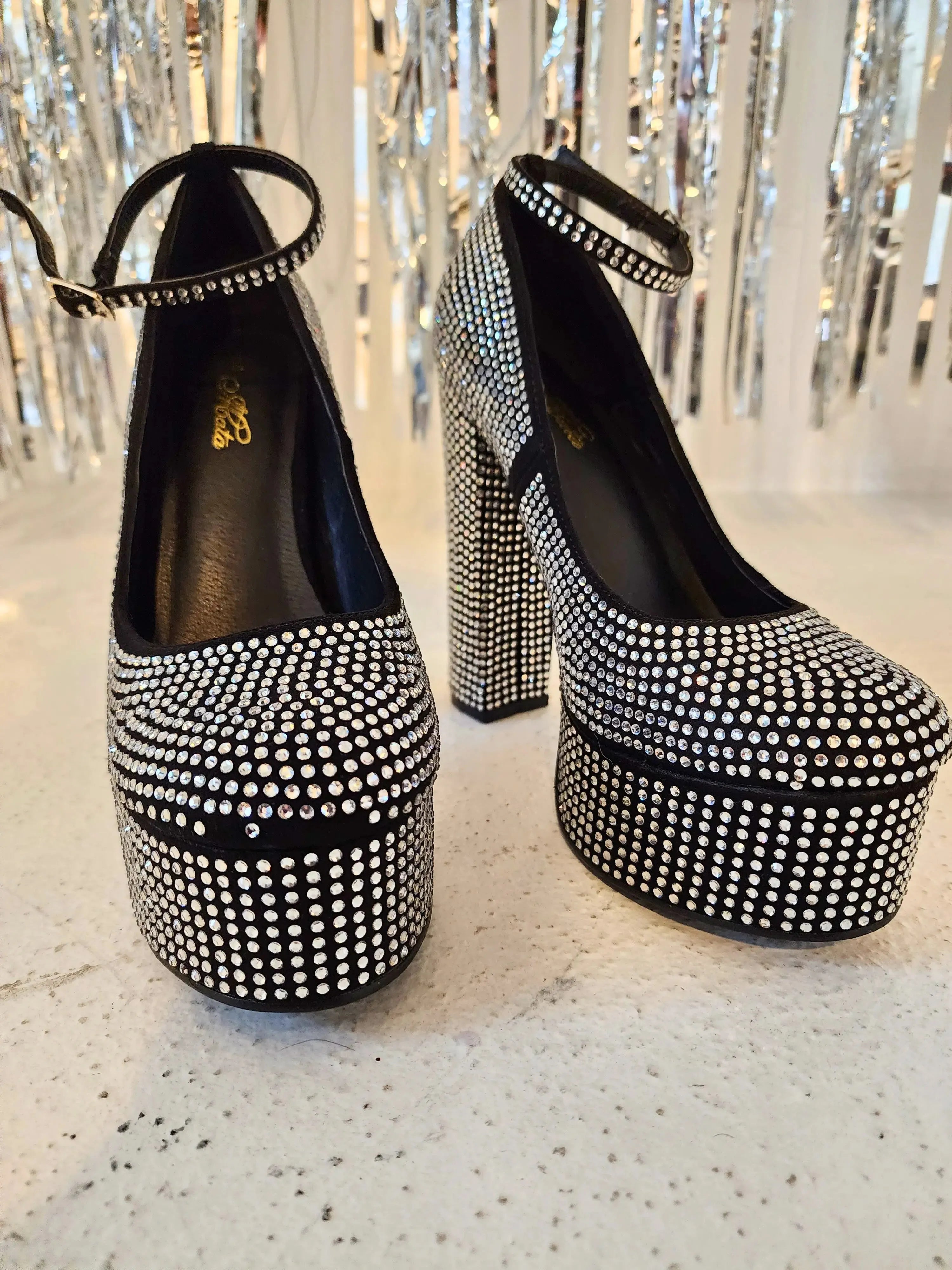 Black glitter heels with sparkly rhinestones perfect for a gown or stylish evening look.