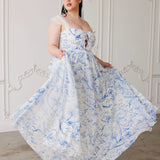 Flowing white and blue floral gown with off-shoulder design in Blue Toile Lovers Gown