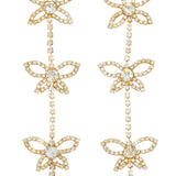 Gold and diamond floral drop earrings ideal for a gown or puff dress with grand bow sash