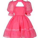 Bright pink puffy-sleeved 18th dress with lace trim and cutout neckline, featuring a grand bow sash