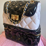 Quilted Classy Jelly Backpack Purse with black and white design and gold chain strap