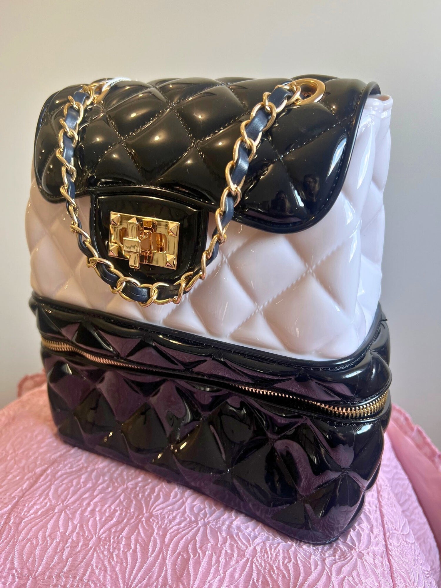 Quilted Classy Jelly Backpack Purse with black and white design and gold chain strap